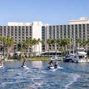 Jet skiers enjoying nice day outside Sheraton San Diego Hotel & Marina